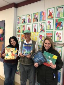 Staff from C. F. Brown Elementary School in Modesto receive donation of poetry books from Sal Salerno of Modesto-Stanislaus Poetry Center & Modesto's poet laureate