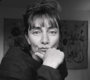 Black and white headshot of poet Nichole Turnbloom